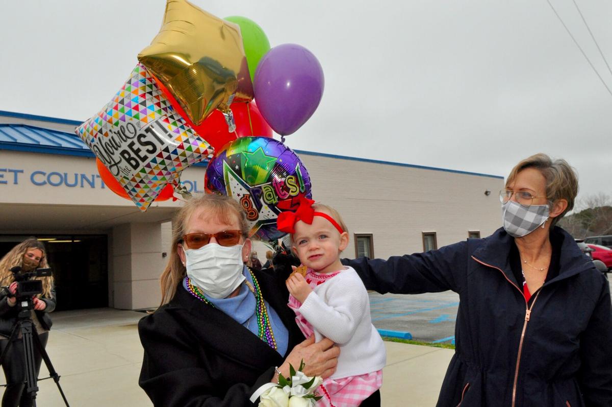 Community comes out to honor Nance with festive retirement parade