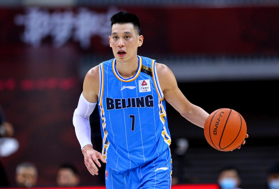 This photo taken on August 4, 2020 shows Beijing Ducks&#39; Jeremy Lin driving the ball during the Chinese Basketball Association (CBA) match between Beijing Ducks and Guangdong Southern Tigers in Qingdao in China&#39;s eastern Shandong province. (Photo by STR / AFP) / China OUT (Photo by STR/AFP via Getty Images)