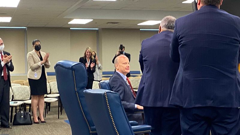 University System of Georgia Chancellor Steve Wrigley, seated, gets a standing ovation from state Board of Regents members and staff during his final scheduled meeting as chancellor on Tuesday, May 11, 2021. Wrigley plans to retire at the end of June. ERIC STIRGUS/ESTIRGUS@AJC.COM.