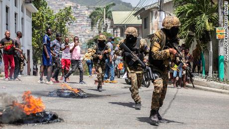 Citizens take part in a protest near the police station of Petion Ville after Haitian President Jovenel Moïse was murdered on July 8, in Port-au-Prince, Haiti. 