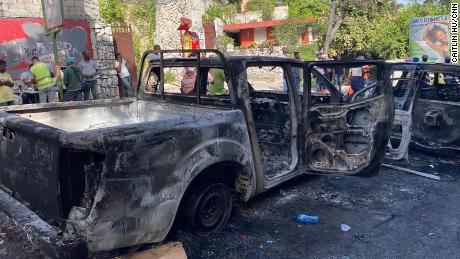 The burned-out remains of cars that belonged to the suspected asassins of Haiti&#39;s President on Route de Kenschoff.