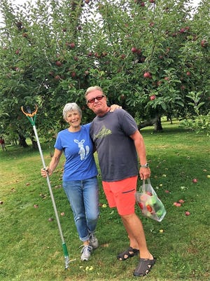 John and Celia Joven chose to retire in Middletown and now fill their days trying Rail Explorers; sailing; and picking apples.