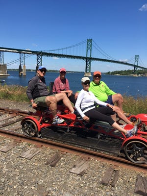 John and Celia Joven chose to retire in Middletown and now fill their days trying Rail Explorers; sailing; and picking apples.