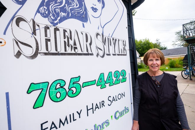 Susan Carrier poses for a portrait Thursday, Sept. 9, 2021, at Shear Style in Marine City. After more than 50 years as a hair dresser, Carrier is retiring.